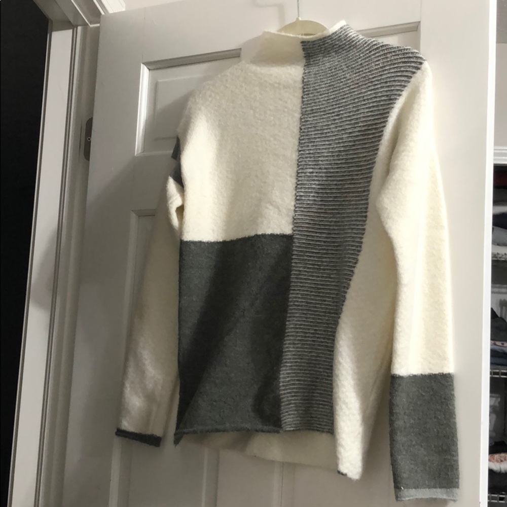white sweater